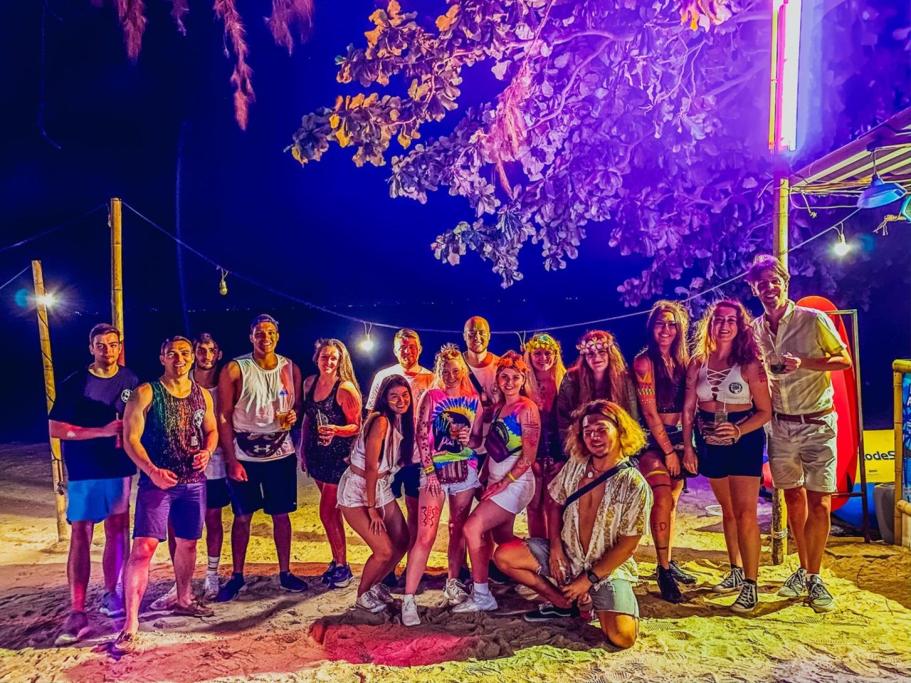 Colourful group picture ready for the full moon party